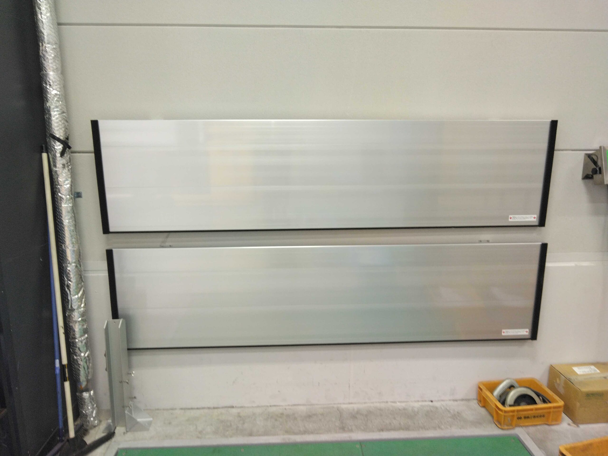 止水板の収納フック取り付け工事